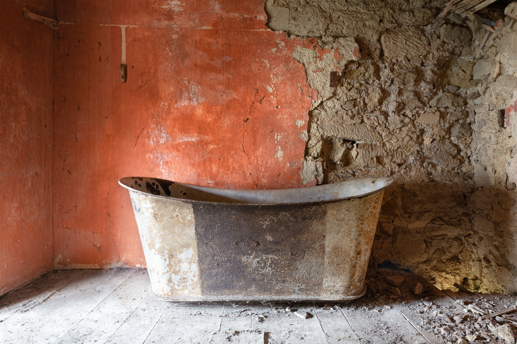 Abandoned bathtub inside a derelict castle located in the south of France