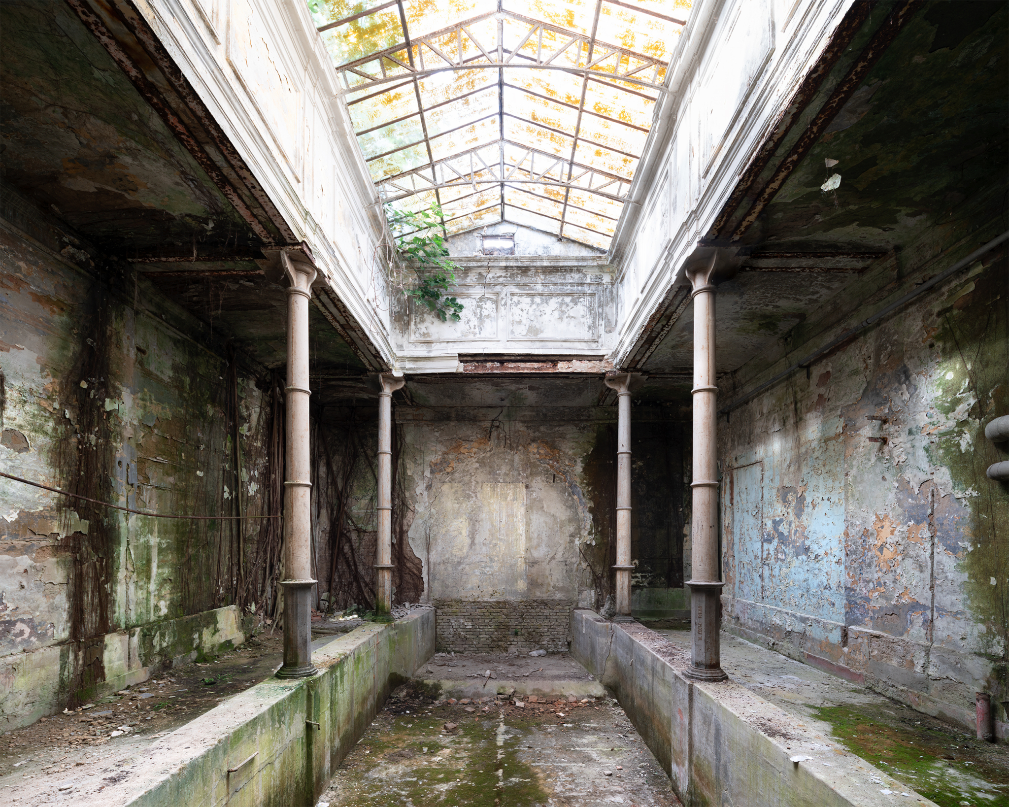 Big pool with huge decay inside derelict baths in Europe